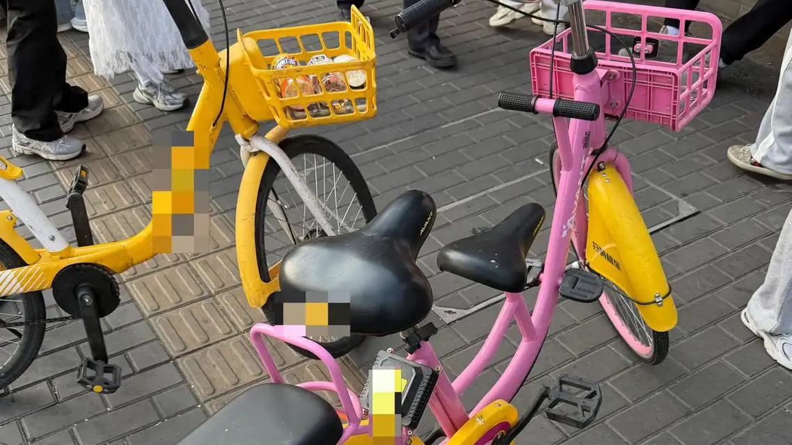 违规亲子共享单车再现：车从哪儿来